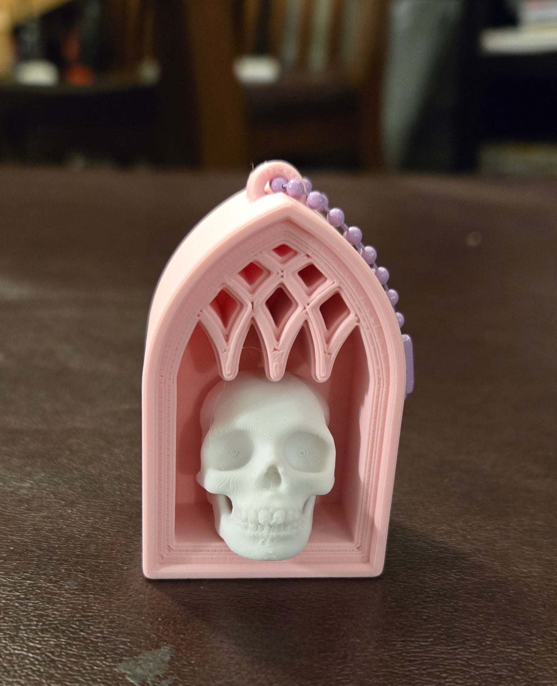 Pink shelf skull clicker