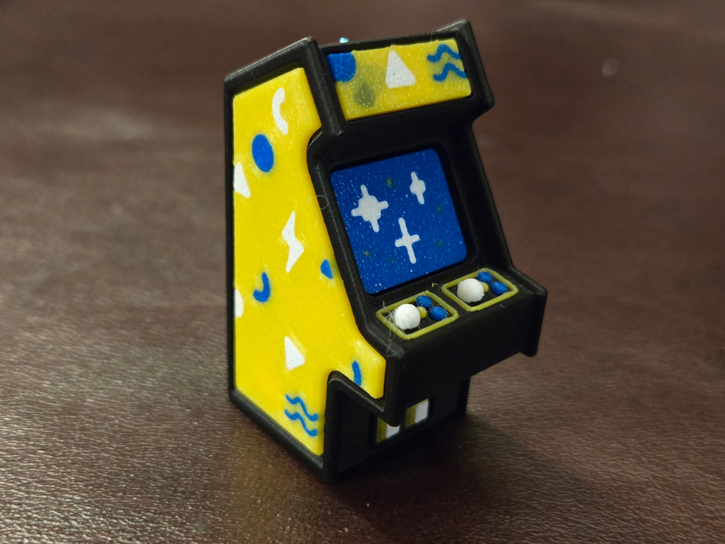Black and yellow arcade clicker