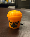 Glowing jack-o'-lantern boo bucket clicker
