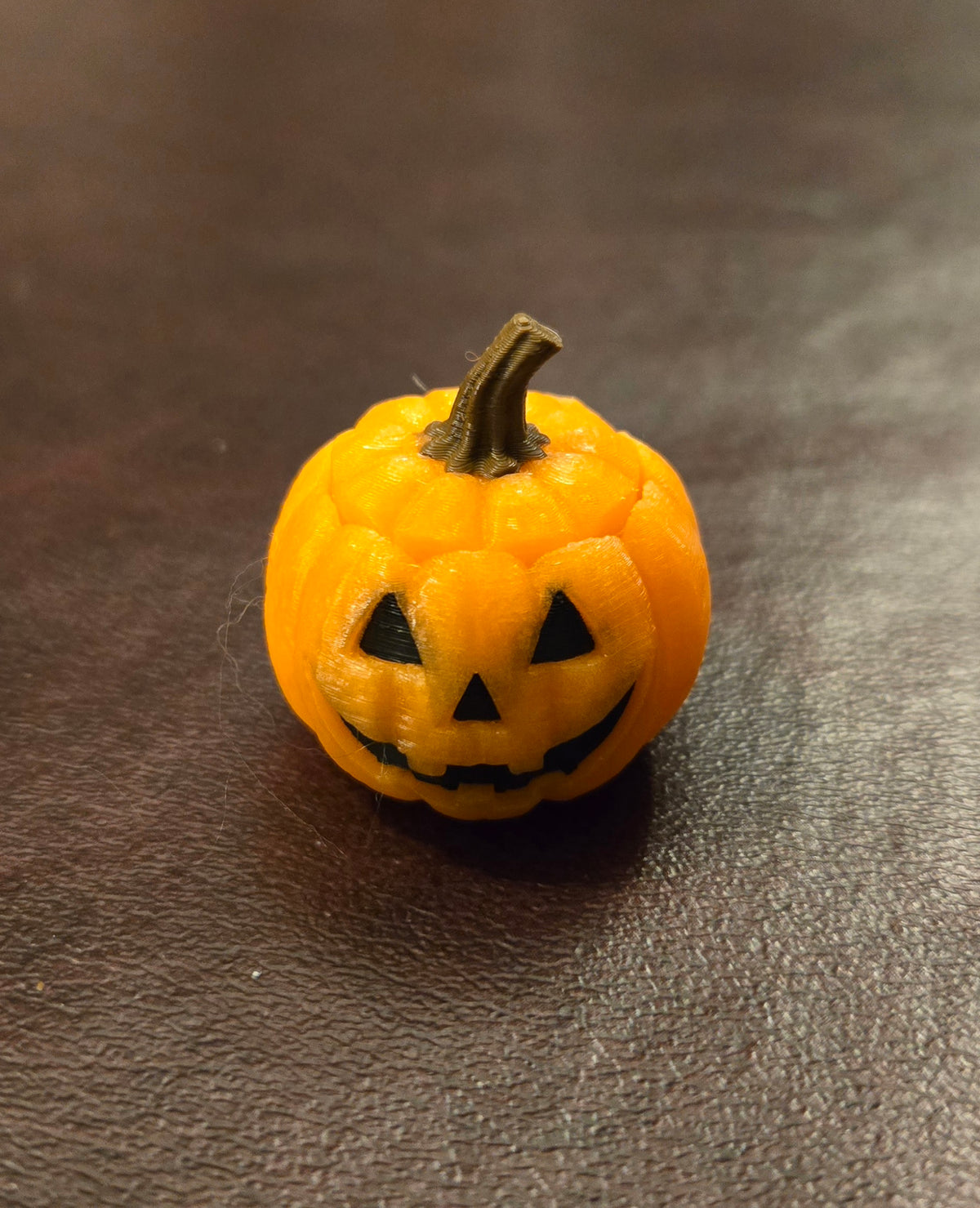 Glowing jack o lantern clicker