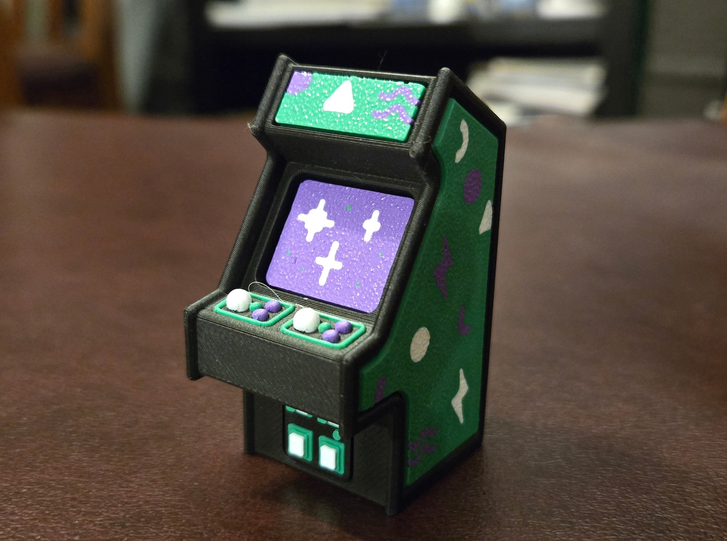 Purple and green arcade clicker